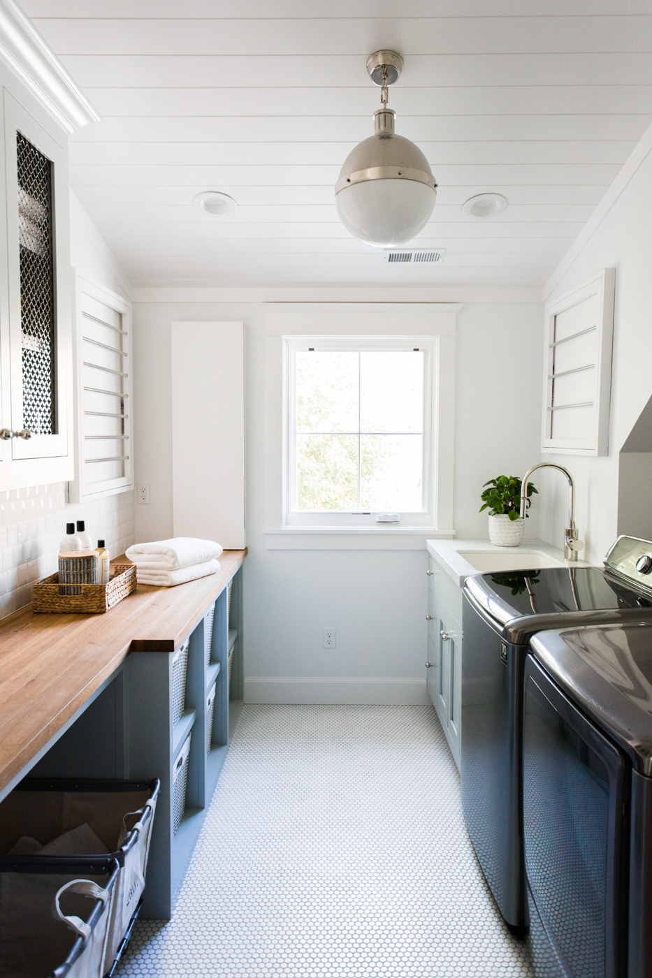 Green+cabinets+with+butcher+blog,+white+penny+tile+laundry+room+--+Studio+McGee.jpg