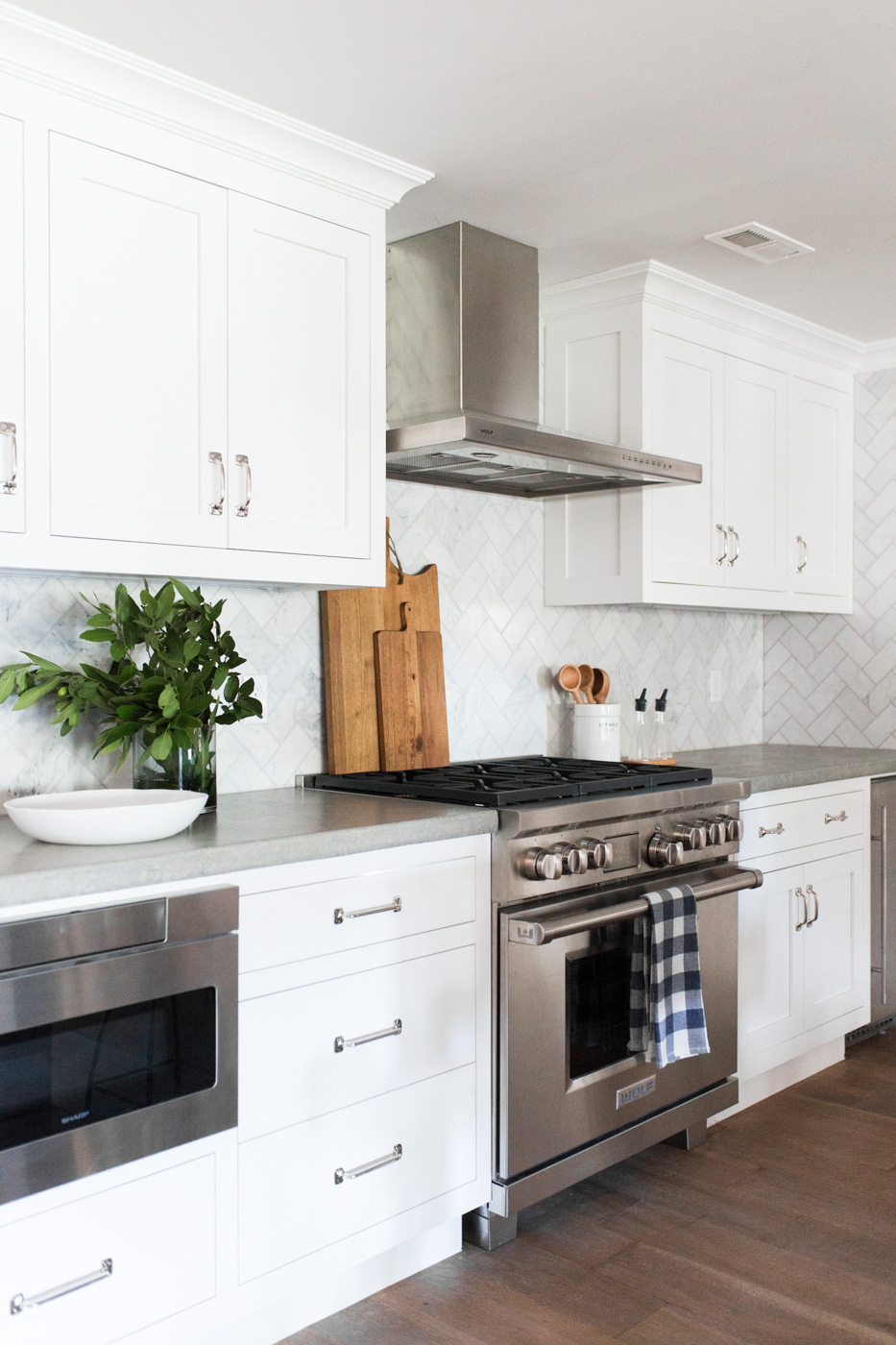Marble+Herringbone+Backsplash+and+Concrete+Counters+--+Studio+McGee.jpg