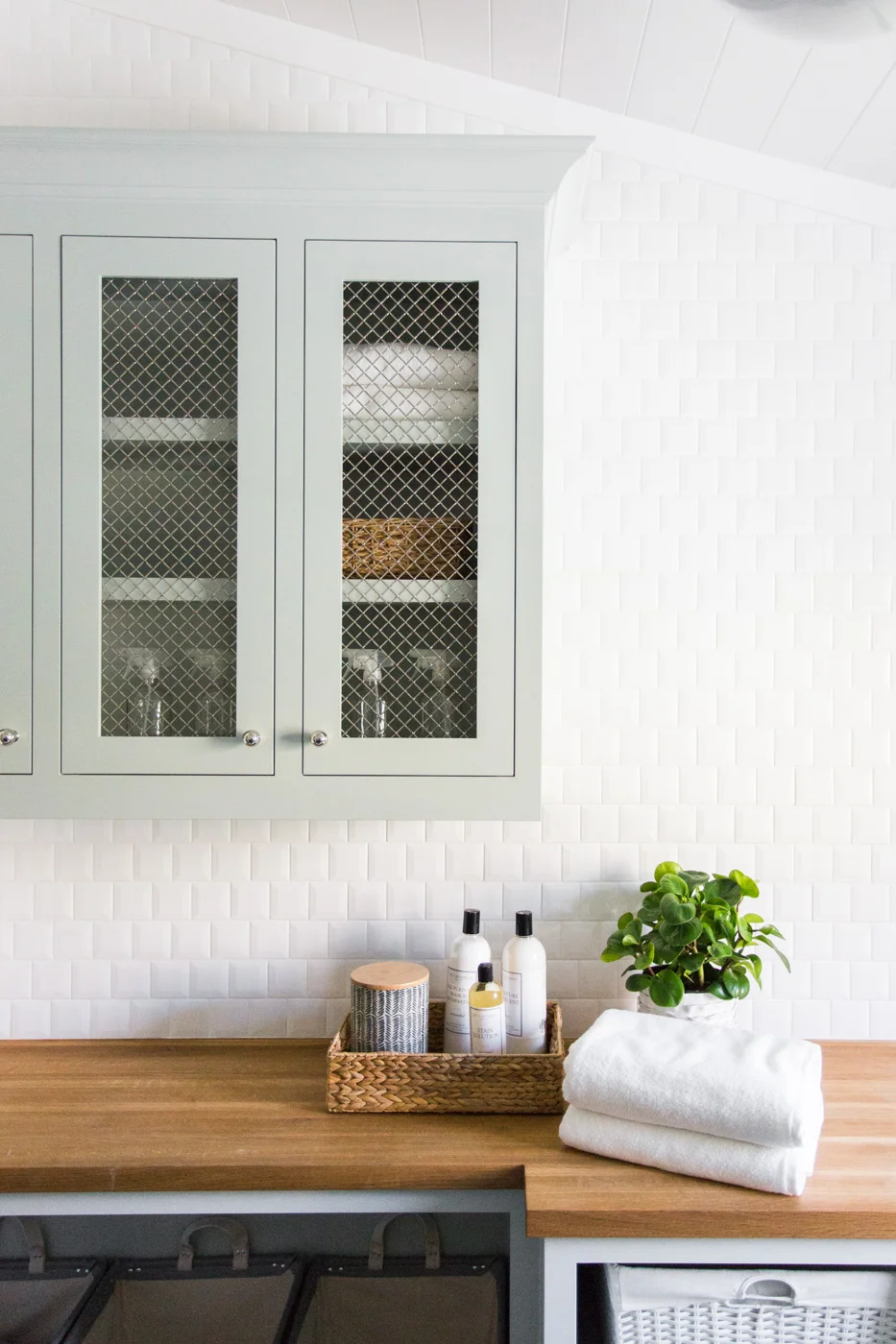 Sherwin+Williams+Silver+Strand+Cabinets+with+chicken+wire+fronts,+butcher+block+counters+and+the+prettiest+beveled+square+tile+--+Studio+McGee.jpg