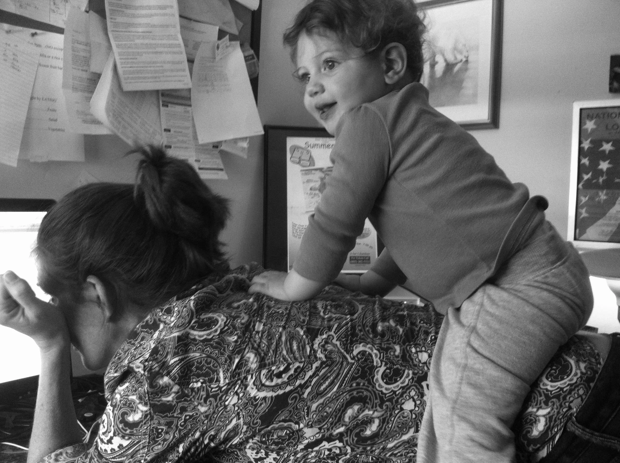 Liz Cotone - writing my Masters Thesis in 2012 with baby Jenny's help
