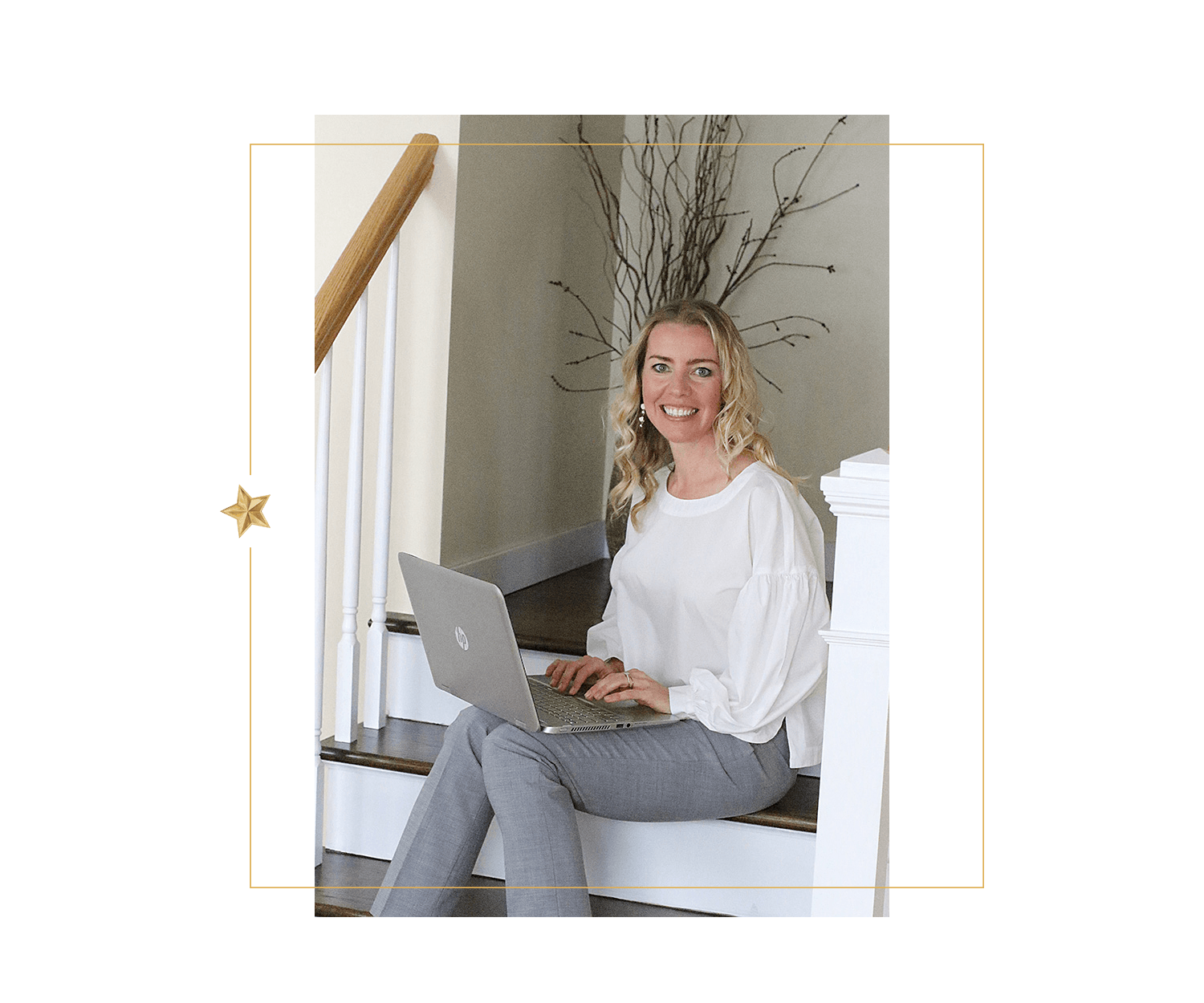 Joana Echols sitting on stairs with laptop vertical.png