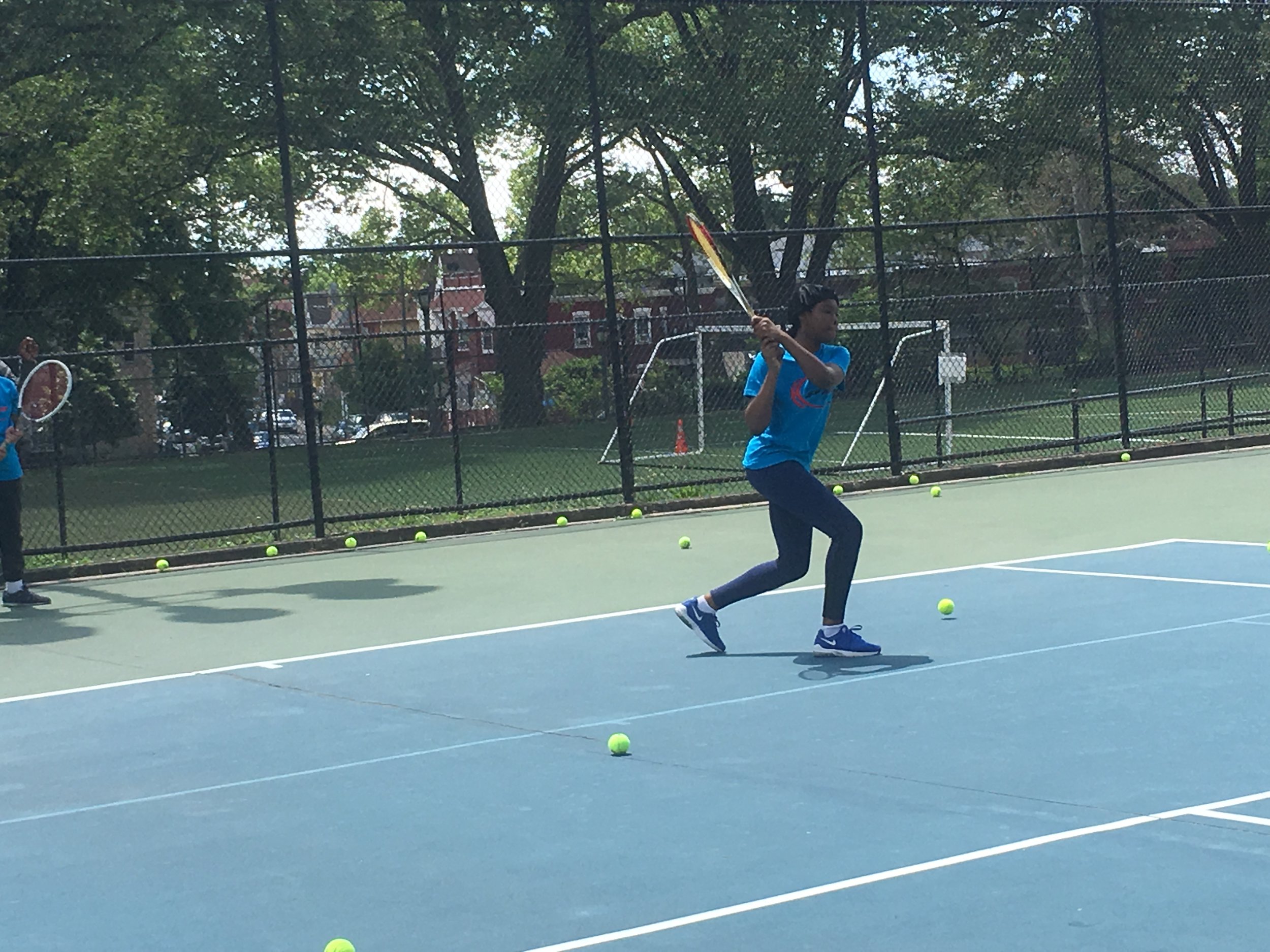 Amaree working on her backhand.