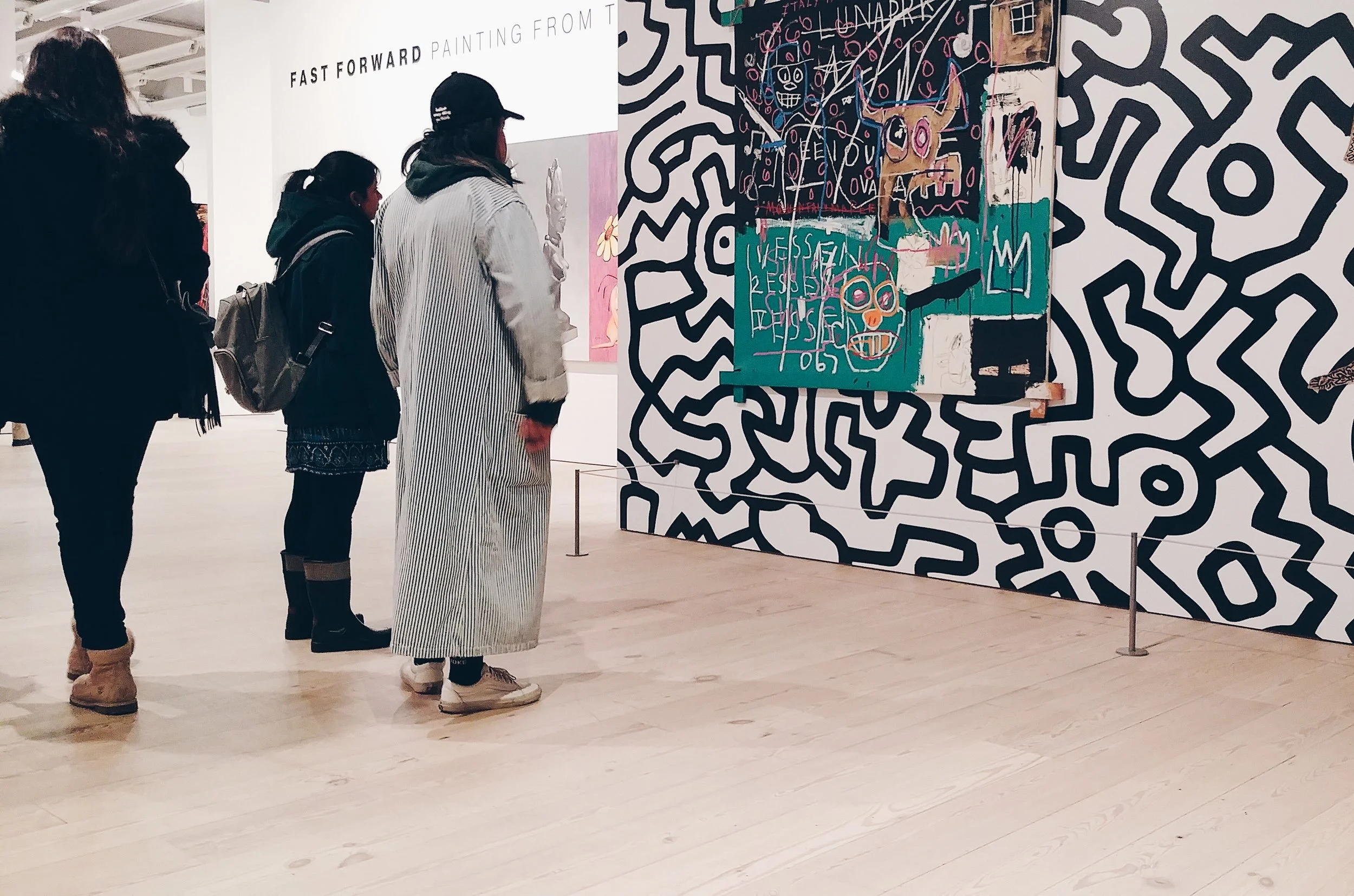 i love her coat. goes with basquiat and keith haring's art.JPG