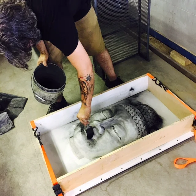The cement form lightly covered in graphite powder. 