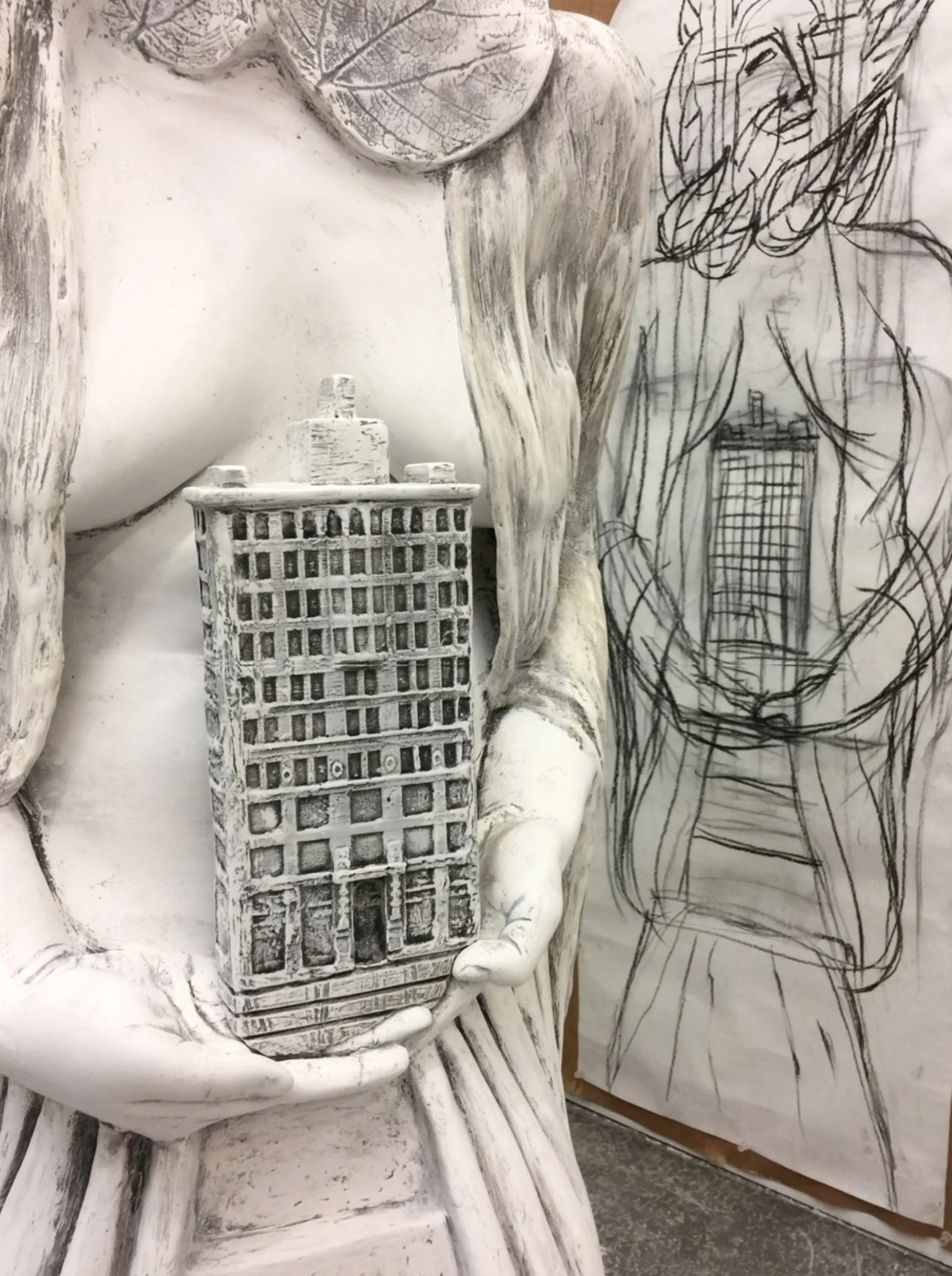 Sculpture detail next to scale sketch. Photo courtesy of the artist.