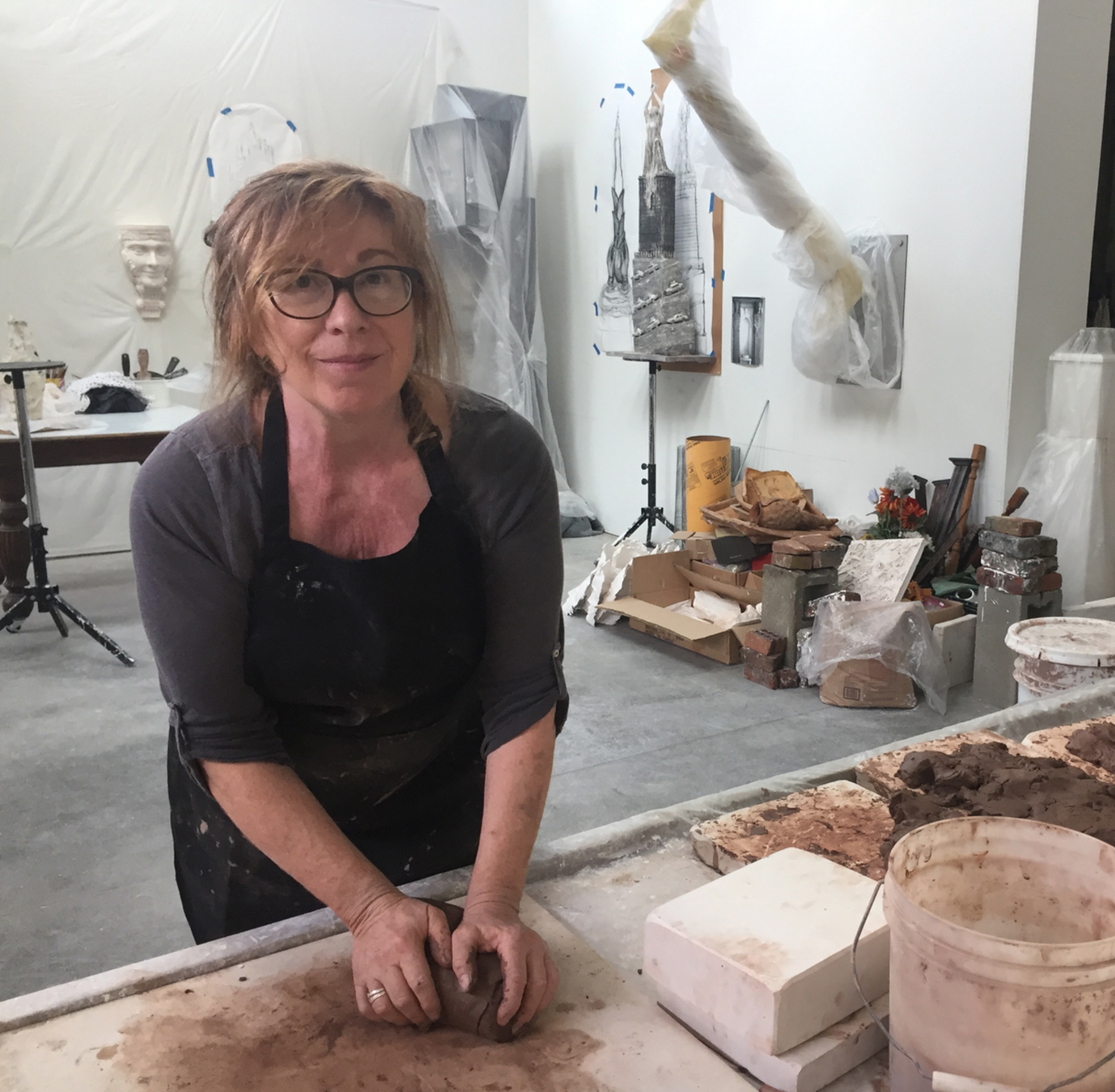 Leslie Fry in her studio preparing clay for the hotel project. Courtesy of the artist.