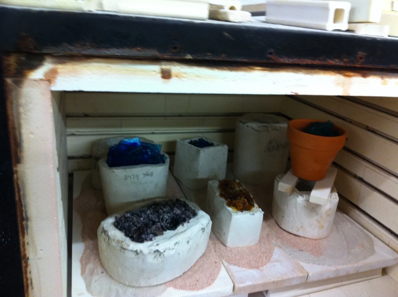 A kiln full of student casting projects