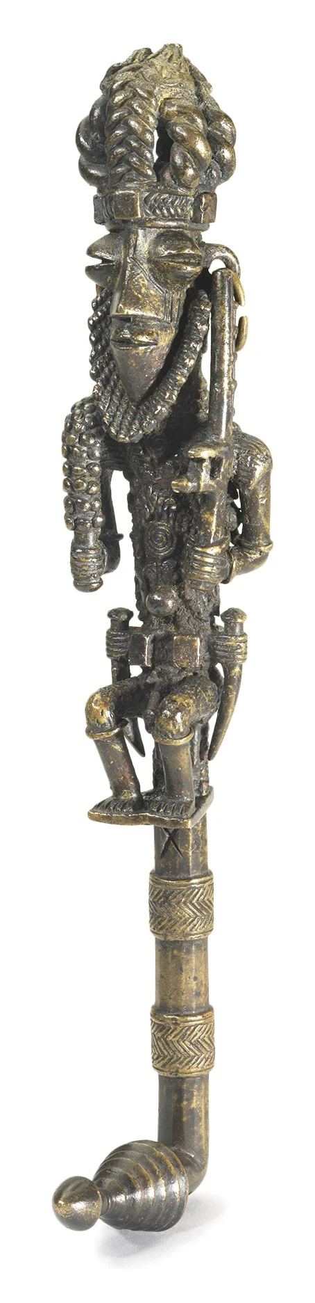 Artist unknown (Yorùbá peoples, Nigeria), title staff of head of blacksmiths ( iwana Ògún), late 19th century, copper alloy (cast). Fowler Museum at UCLA, X70.690; Gift of the Ralph B. Lloyd Foundation