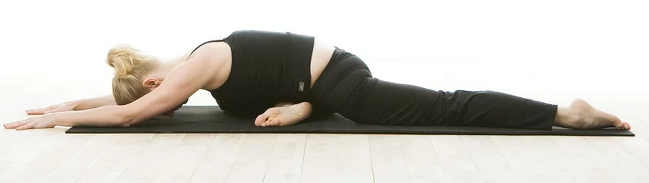 1. In Table Pose. Bring your right knee between your hands, placing your right ankle near your left wrist. 2. Extend your left leg behind you so your kneecap and the top of your foot rest on the floor. 3. Press through your fingertips as you lift your torso away from your thigh. Lengthen the front of your body. Release your tailbone back toward your heels. Work on squaring your hips and the front side of your torso to the front of your mat. 4. Draw down through your front-leg shin and balance your weight evenly between your right and left hips. Flex your front foot. Press down through the tops of all five toes of the back foot. 5. Gaze downward softly. 6. Hold for up to one minute. To release the pose, tuck your back toes, lift your back knee off the mat, and then press yourself back into Downward-Facing Dog. Repeat for the same amount of time on the other side.