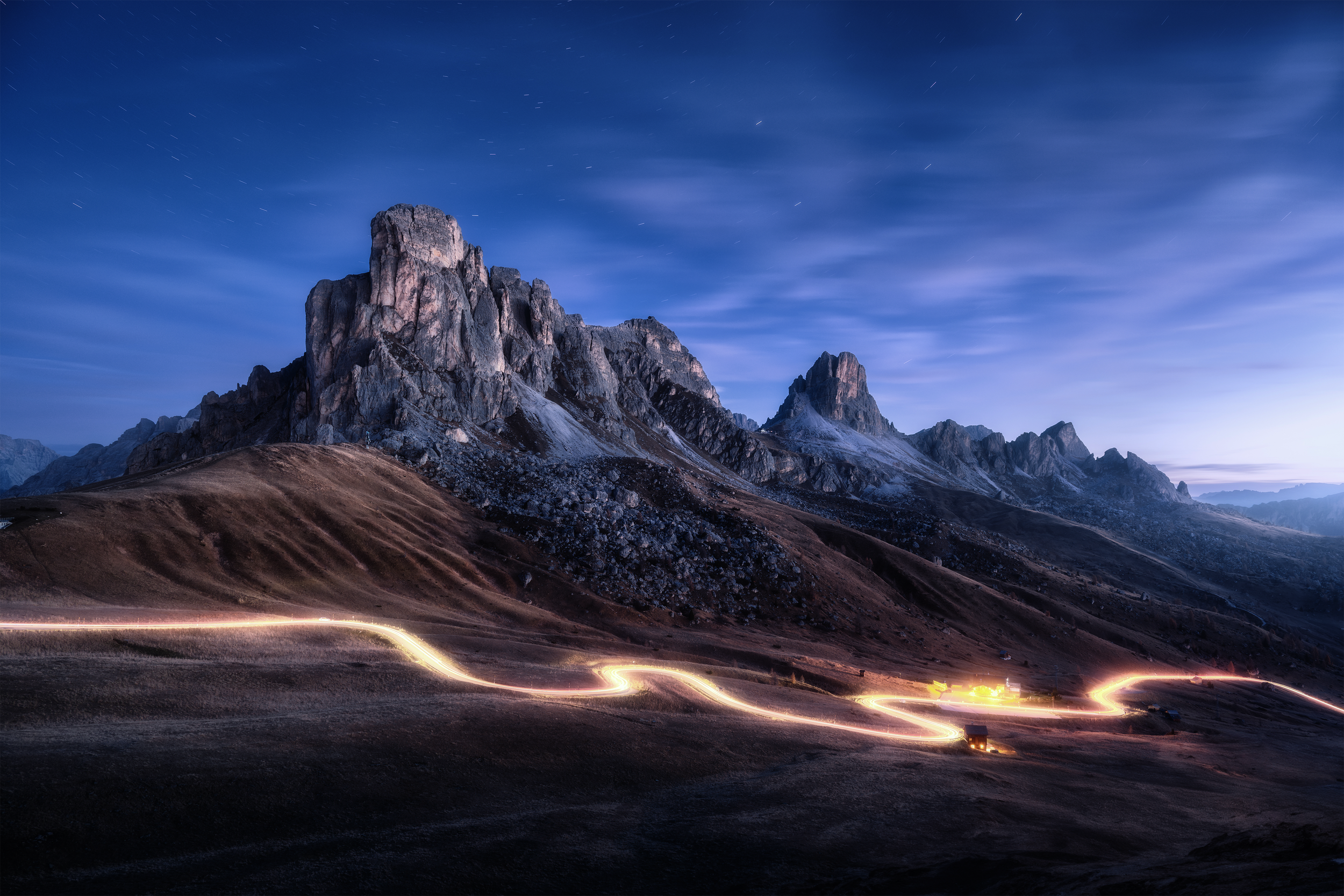 Night landscape showing lights on a trail.