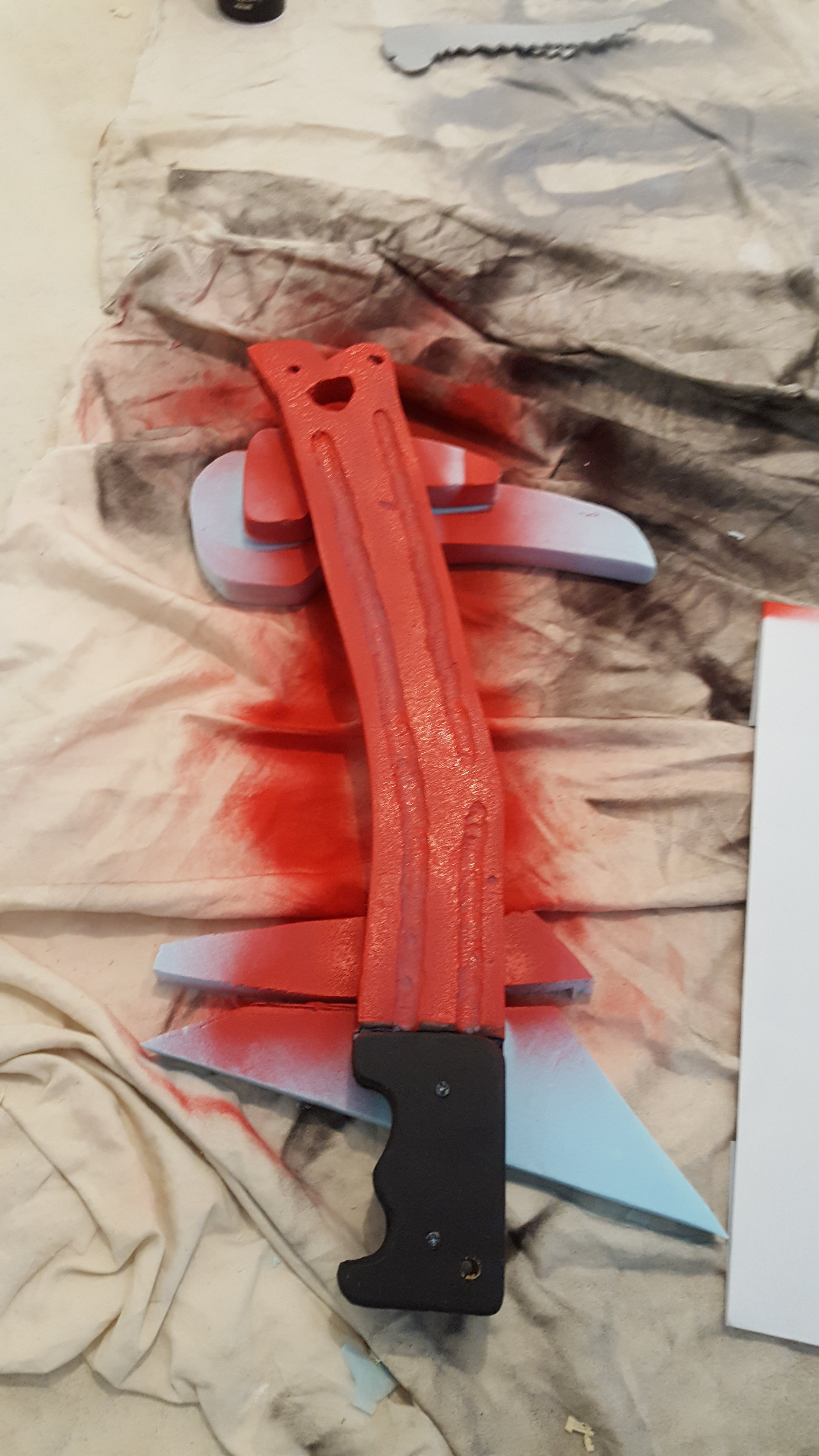 Handle attached and spraypainting in progress.
