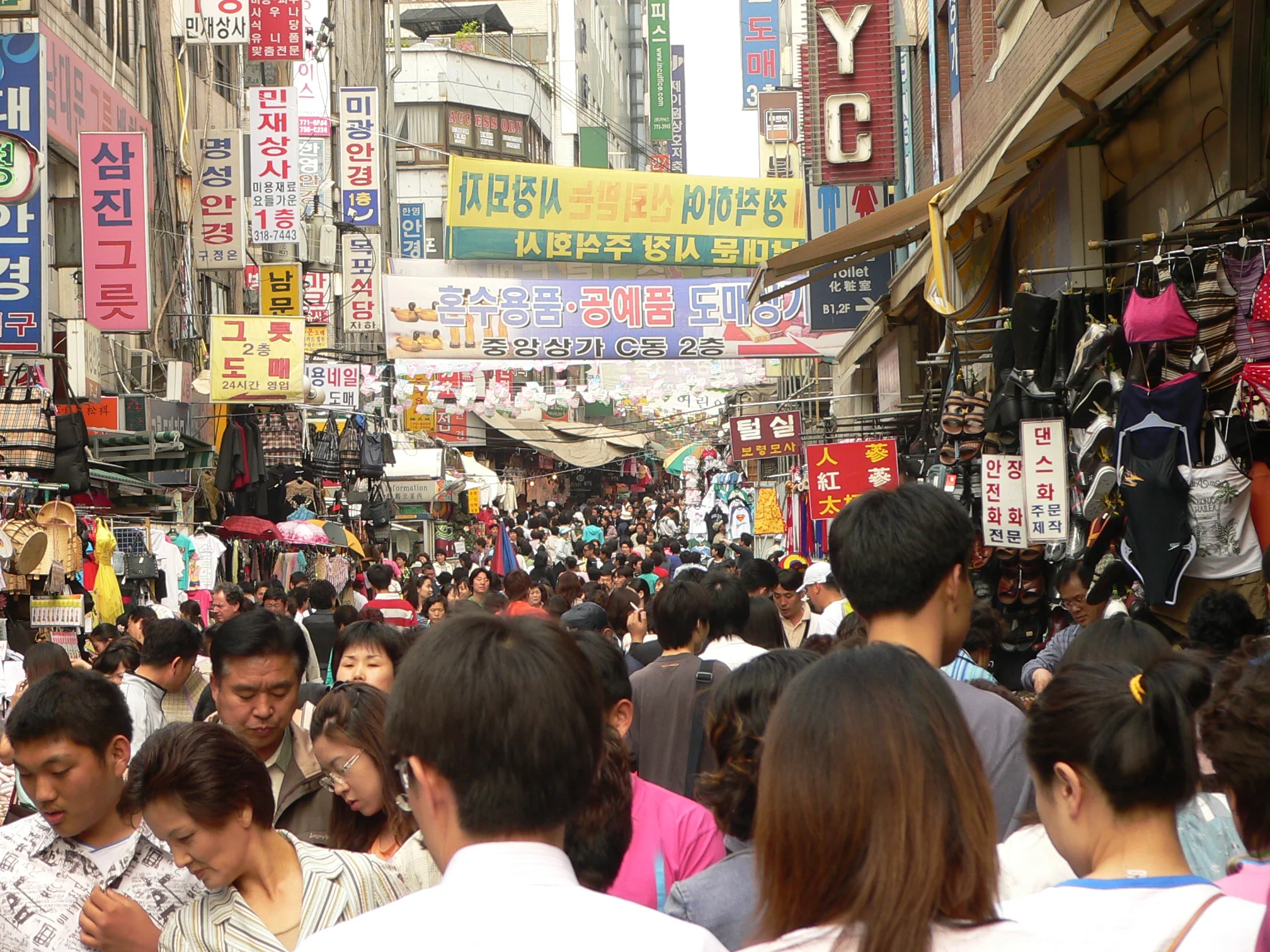 Crowded scenes like this market in Seoul are going to become the norm for cities worldwide. Photo Credit: Crowded by Craig Nagy, via Flickr, CC BY-SA 2.0