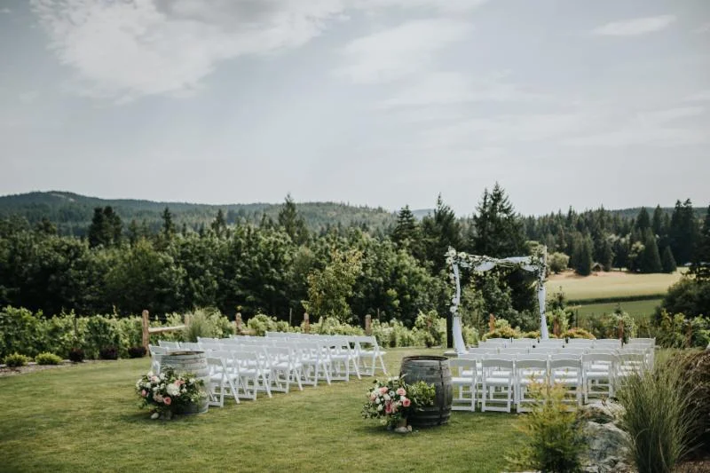 Sweeping valley views on the ceremony grounds at Blue Grouse Estate Winery. Photo Credit Sweet Heirloom Photography.