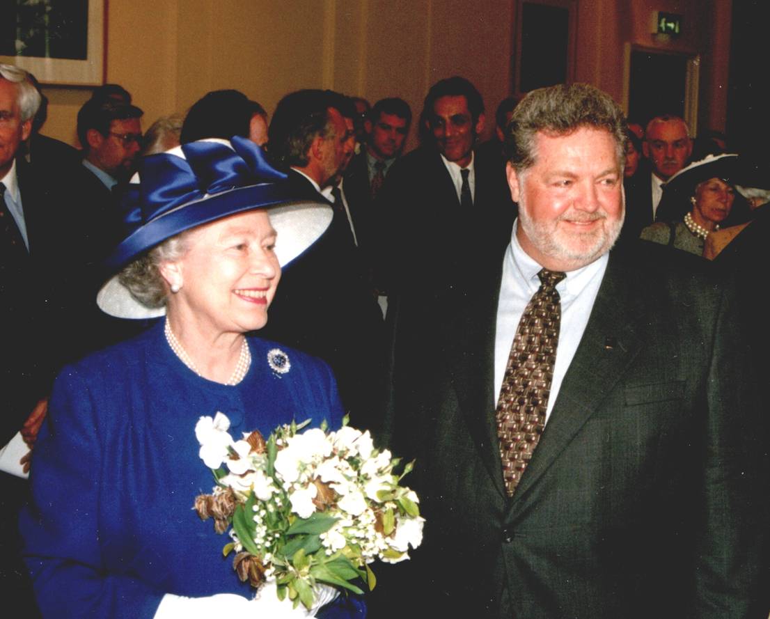 Encore_Harry McWatters with Her Majestry Queen Elizabeth II at Canada House Reopening May 1998 credit Tim Pawsey of Hired Belly.jpeg