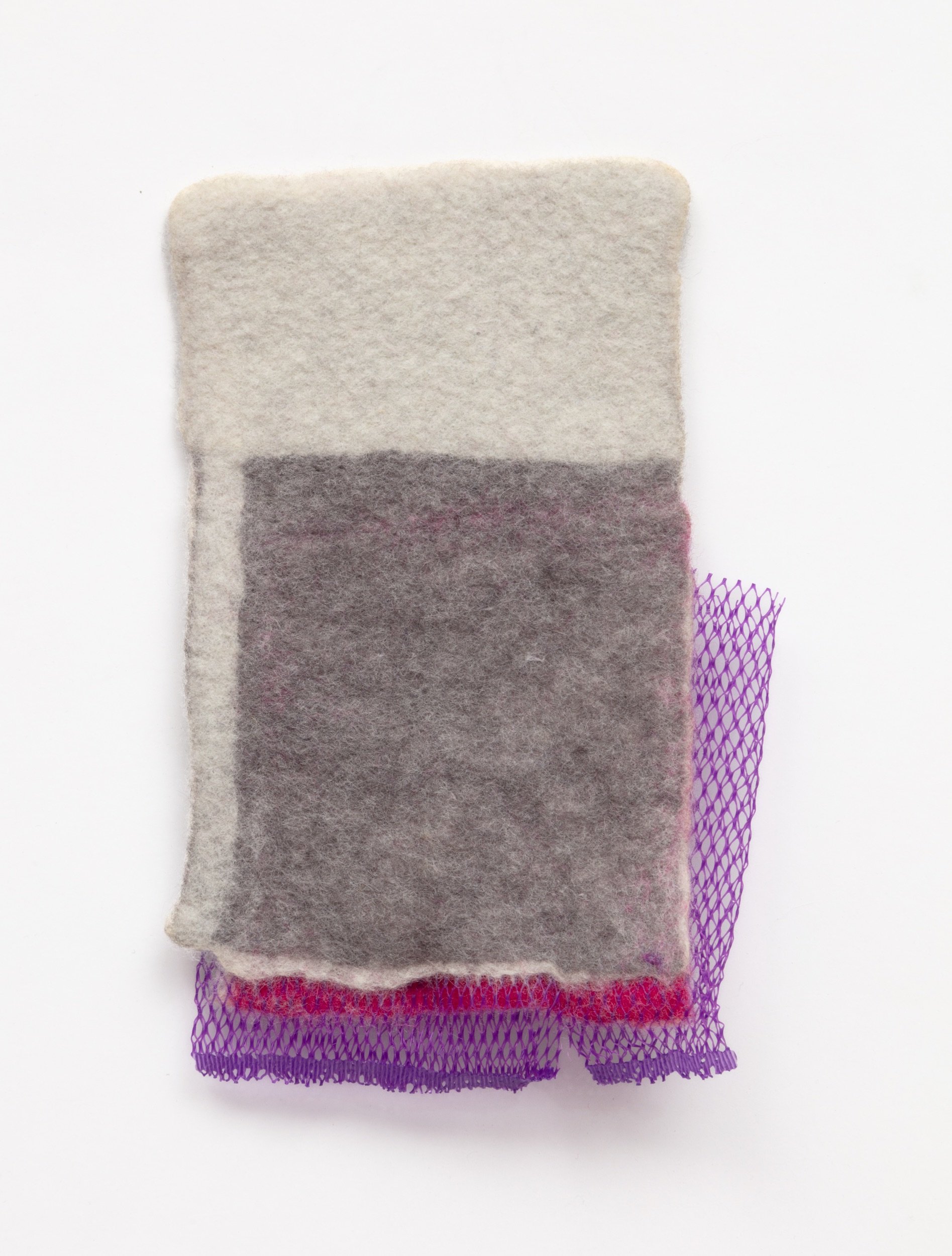  Untitled, 2021 (back)  Handfelted merino wool, plastic produce net 
