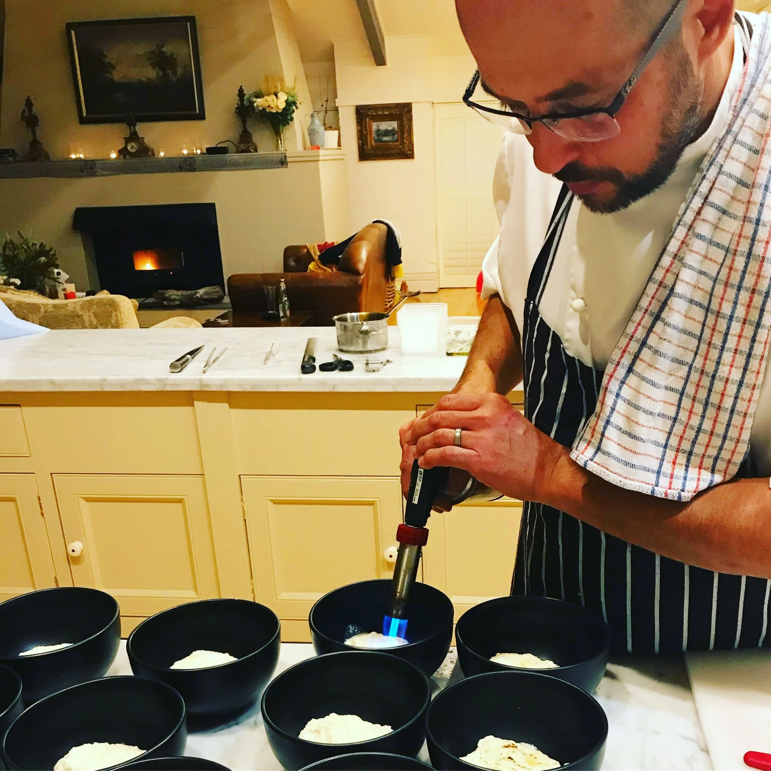 Sydney Private chef torching a delicious rice pudding