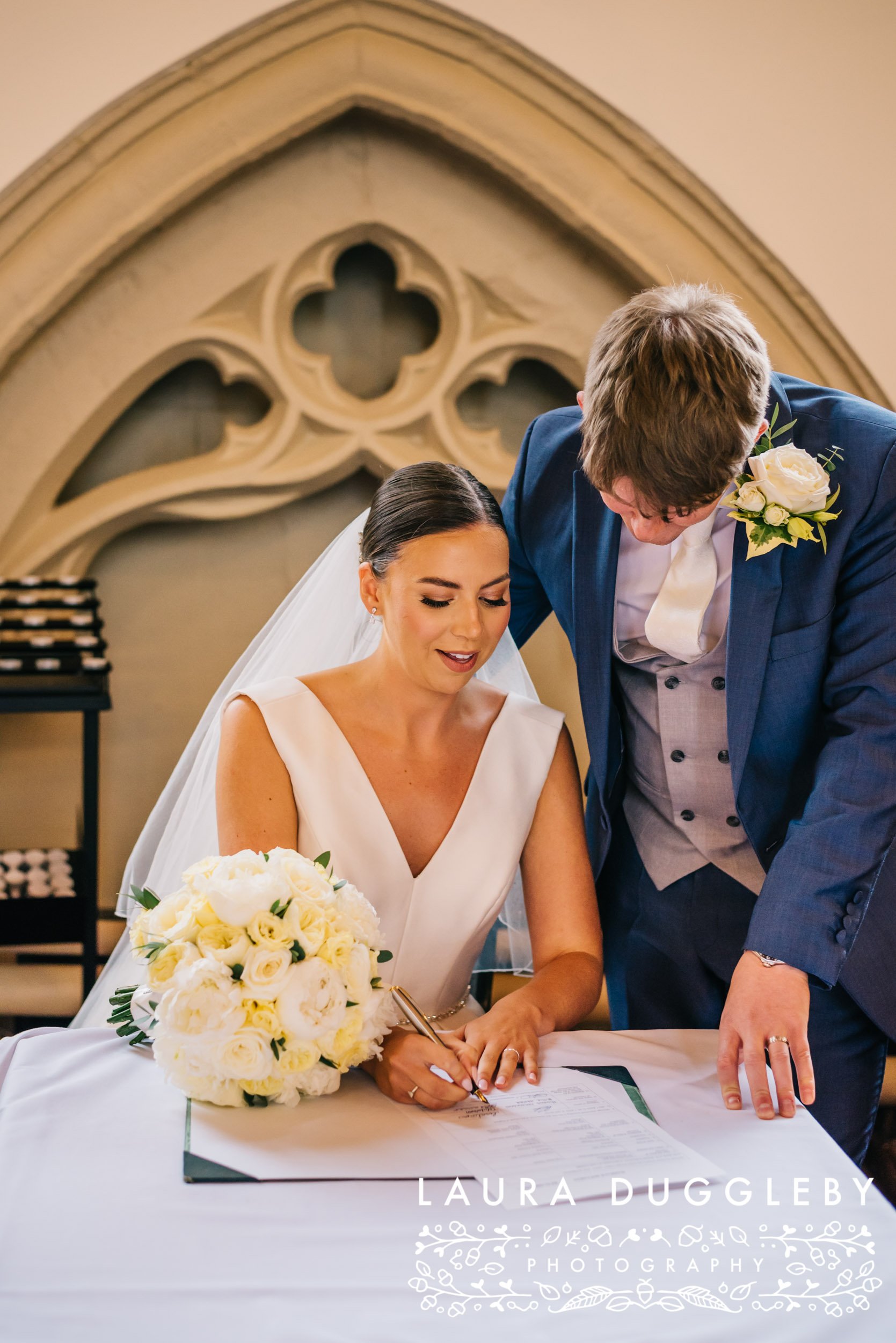 signing the register church wedding photography lancashire
