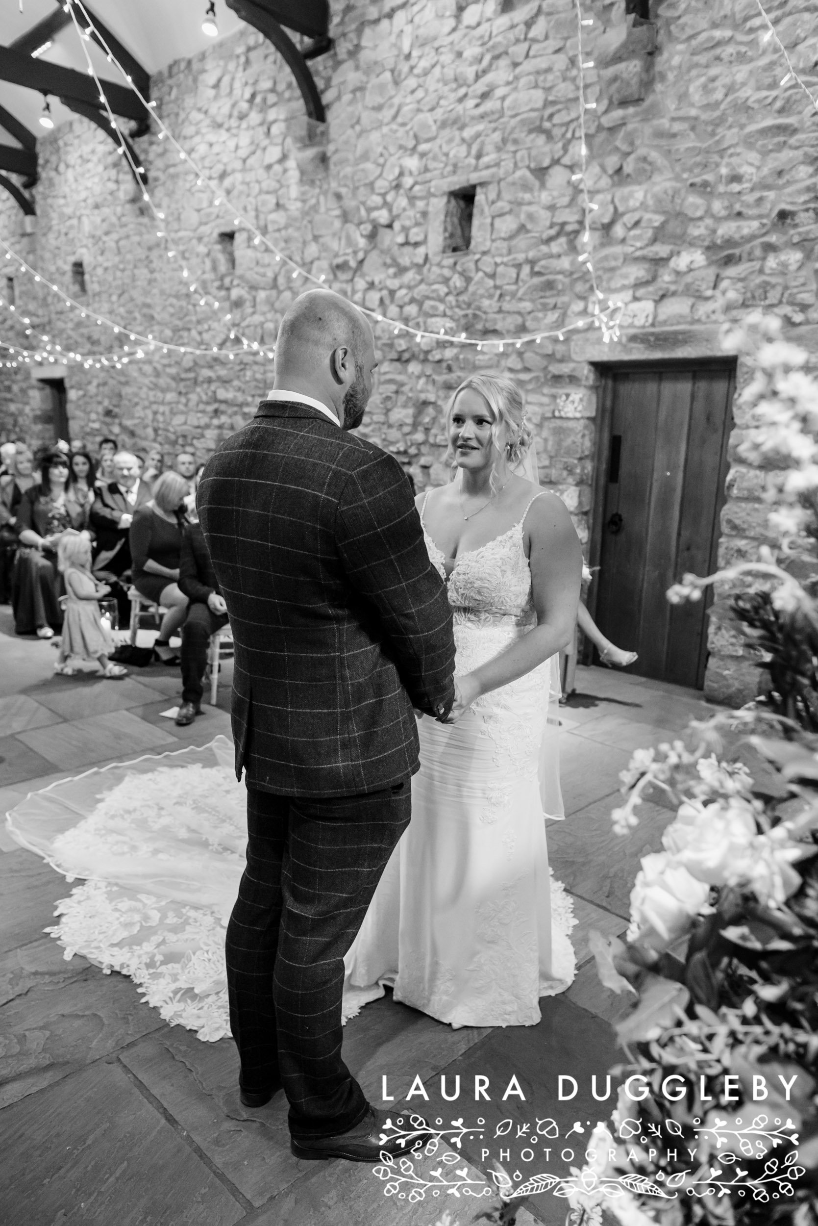 bride and groom exchanging wedding vows browsholme hall clitheroe