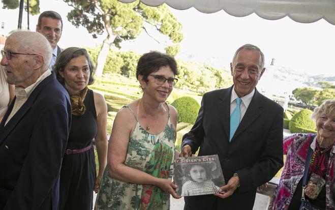 Joan presents My Sister's Eyes to President Marcelo Rebelo de Sousa of Portugal On July 3, 2016, Joan presented My Sister's Eyes to the Portuguese President Marcelo Rebelo de Sousa , as a part of the Sousa Mendes Foundation - " Journey on the Road to Freedom ".
