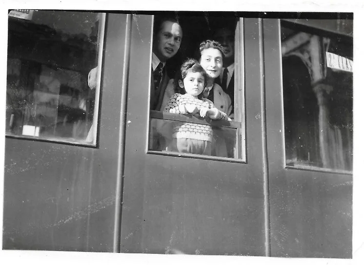 "Leaving Portugal" January 23, 1942 Caldas da Rainha train station - Ignas, Hala and Yvonne Krakowiak with Senhor Alberto Malafaia in the shadow. Photographer unknown.