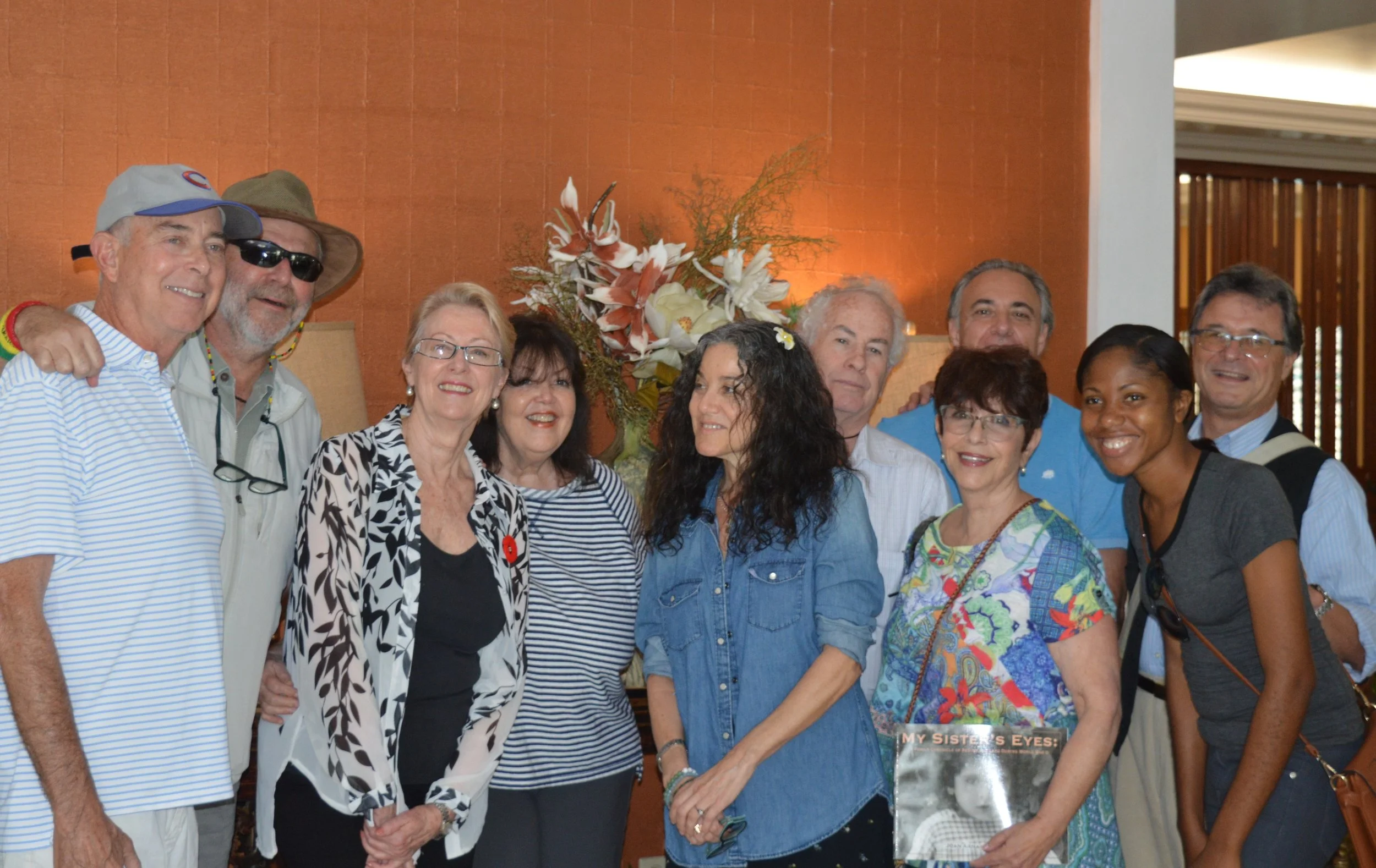 L to R: Alan (Gary’s cameraman), Gary Robinson. Margaret Thompson, Diana Cooper-Clark. Amy Wachtel, Itzhak Halperin, Joan Halperin, Inez Bakers’ son (behind Joan), College student reporter on Gary’s Team, Robert Jacobvitz.