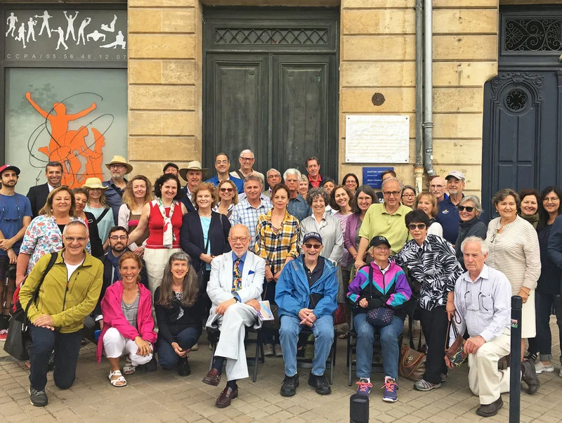 Those who were helped by Portugal's consul general, Aristides de Sousa Mendes, during World War II assemble outside the former Portuguese consulate in Bordeaux. Sousa Mendes issued 10,000 visas to Jews including Stephen Rozenfeld (center front, in blue), George Helft (center front, in white) and Lissy Jarvik (third from right), before being recalled and dismissed from the diplomatic service. Eleanor Beardsley/NPR