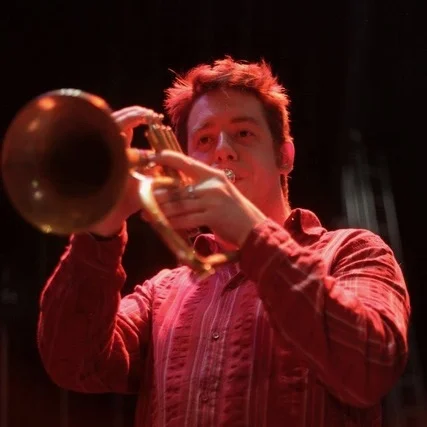 Marc De Vresse Marc gets contaminated by the trumpet ’virus’ at the age of 9 and starts his musical education at the academy of Jodoigne in the class of Vincent Fontaine. The passion he has towards his instrument leads him to pursue his school programme in the section Humanités Musicales of the Namur Music School, in the class of Vincent Antoine. Marc starts the Conservatoire Royal de Bruxelles in 2000 in the class of Hervé Noël. He’ll win the 1st prize for trumpet along with the prizes of chamber music and music theory. Later he’ll obtain his Master in the class of Manu Mellaerts at the Koninklijk Conservatorium Brussel as well as the highest teaching qualification (AESS) at the IMEP in the class of Antoine Acquisito. He is interested in all musical styles and participates to many recordings. He performs with several orchestras and bands, in many different music styles (the Opera of Wallonia, the ensemble ‘Musiques Nouvelles’, the orchestra of the ‘Théâtre Royal de la Monnaie’, the Euro Symphonic Orchestra, the Namur Big-Bad, the UTZ, Mother Poscor, Tchala’s Band, Rue Des Pêcheries... and participates to many theatre plays as a musician (Théâtre des Martyrs, Compagnie de Nulle Part) Marc De Vreese is teacher at the music academies of Evere, Frameries and Thuin as well as at the Brussels school ‘Trumpetmania’, which he co-founded.