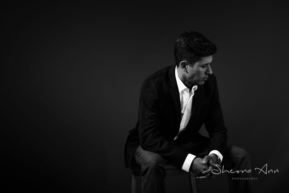 Attractive man sitting thinking 