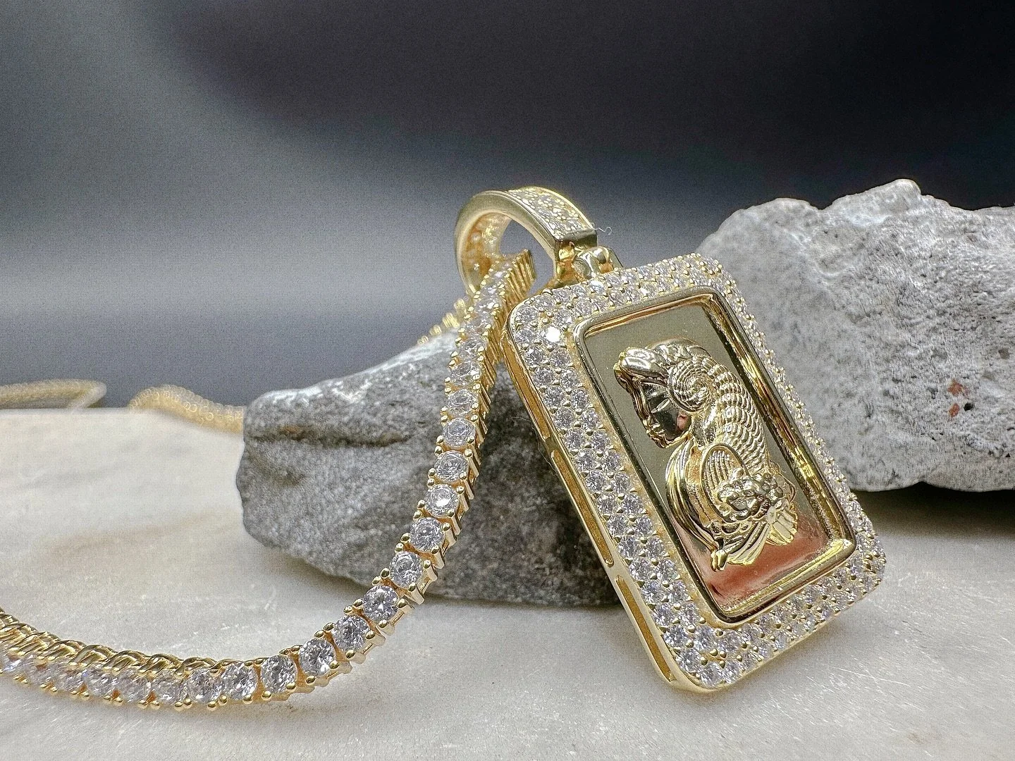Step into your shine with the BKB Lady Fortuna Pendant ( Gold-tone rectangular pendant with 3D Lady Fortuna , engraving lab diamonds ).

STAND OUT WITH UNIQUE STYLE PIECES FROM THE BKB BRAND &bull; CLIENTS TAP IN FOR EXCLUSIVE PIECES NOT FOUND ONLINE