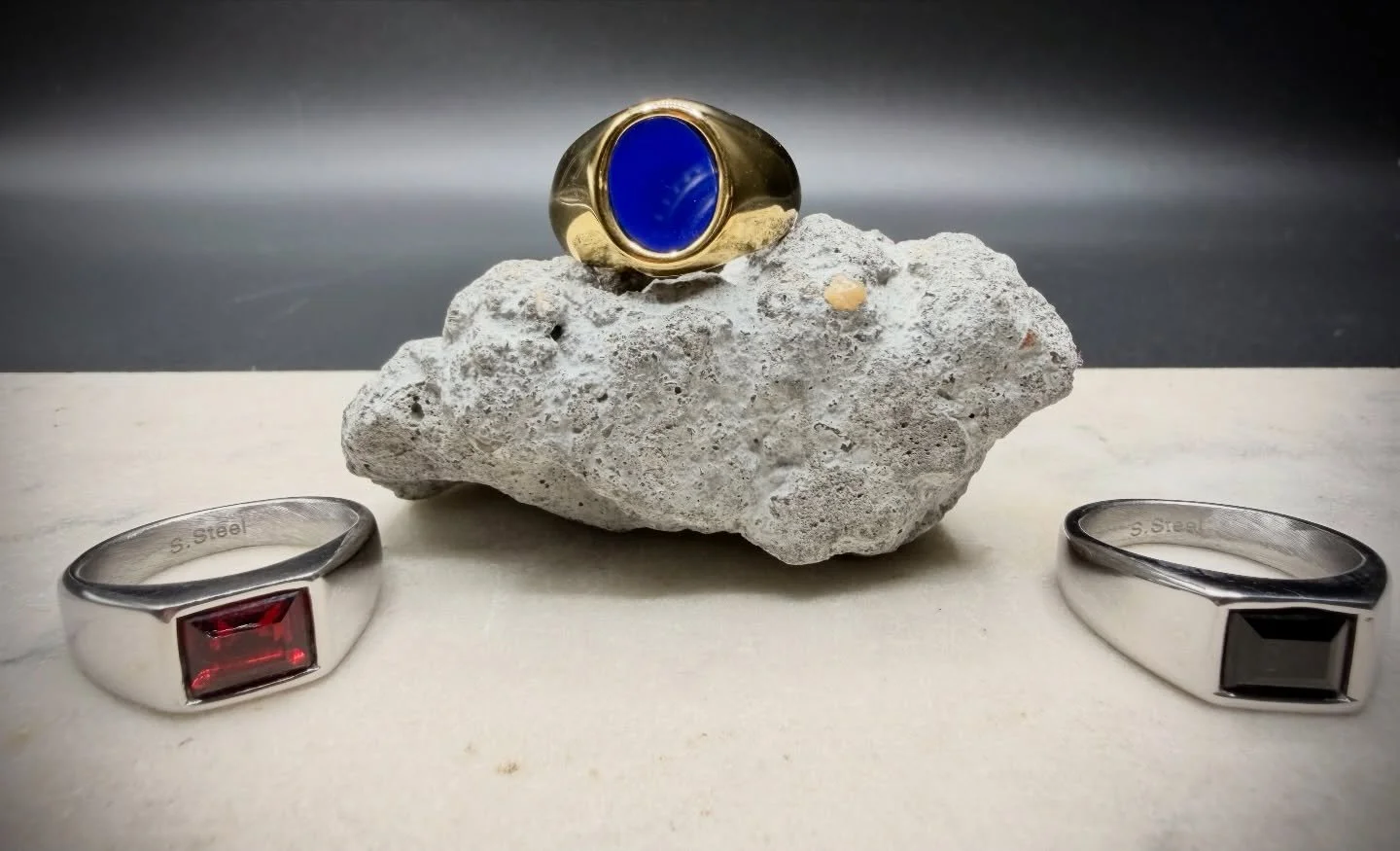 &bull; Meaning of the Blue Stone:
Blue symbolizes clarity, protection, and calm power&mdash;reminding the wearer to lead with focus, truth, and steady ambition.