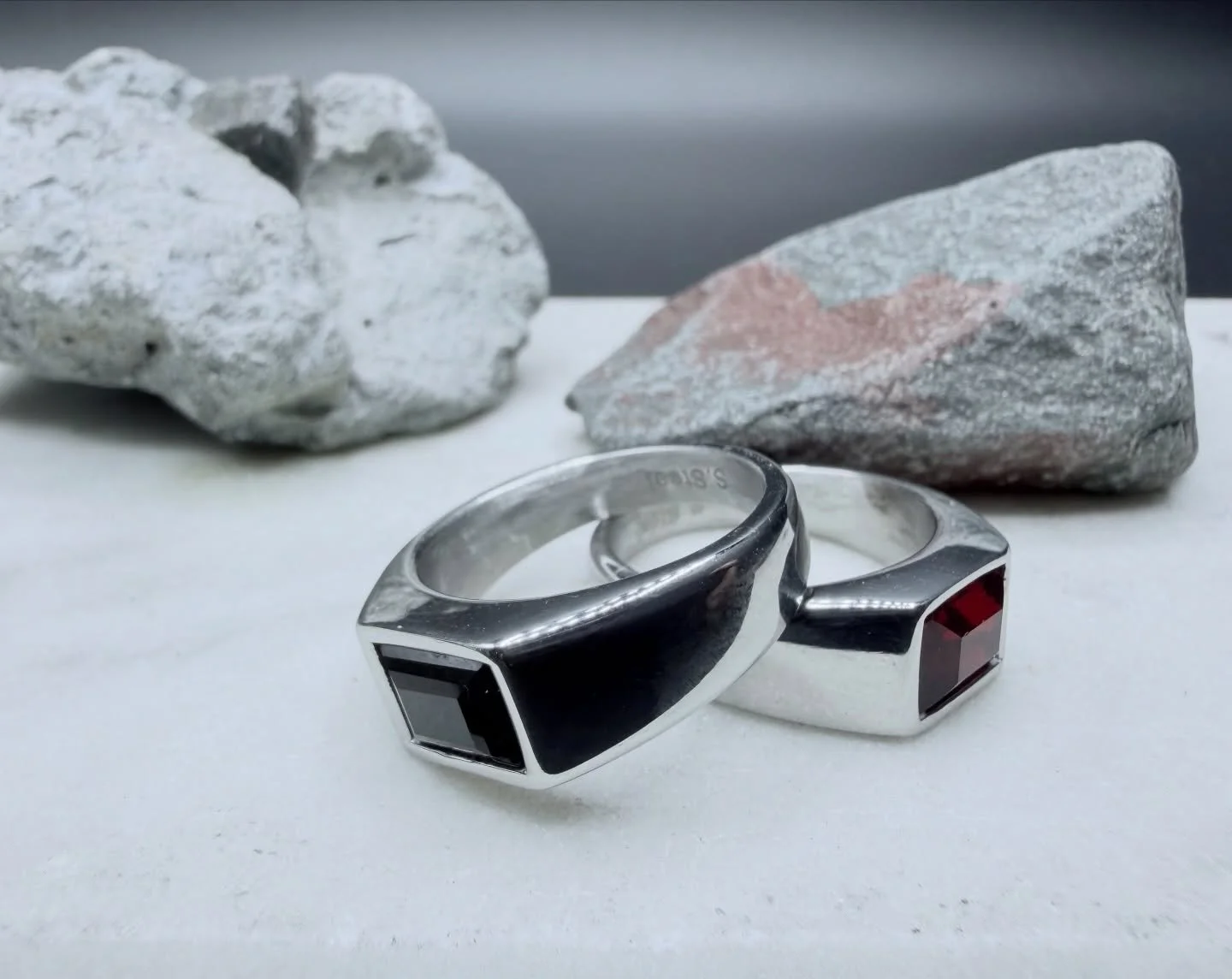 &bull; Meet the BKB Sharp-Edge Signet Ring, crafted in stainless steel silver and set with a sleek emerald-cut stone. Minimal, modern, and built with clean architectural lines&mdash;this ring is all about quiet power and everyday versatility. Availab