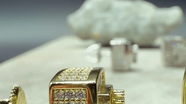 Crafted in solid 925 sterling silver and finished in your choice of gold or silver tone, these statement studs feature precision-set lab diamonds in a bold square silhouette. The combination of baguette and round stones creates a radiant, multidimens