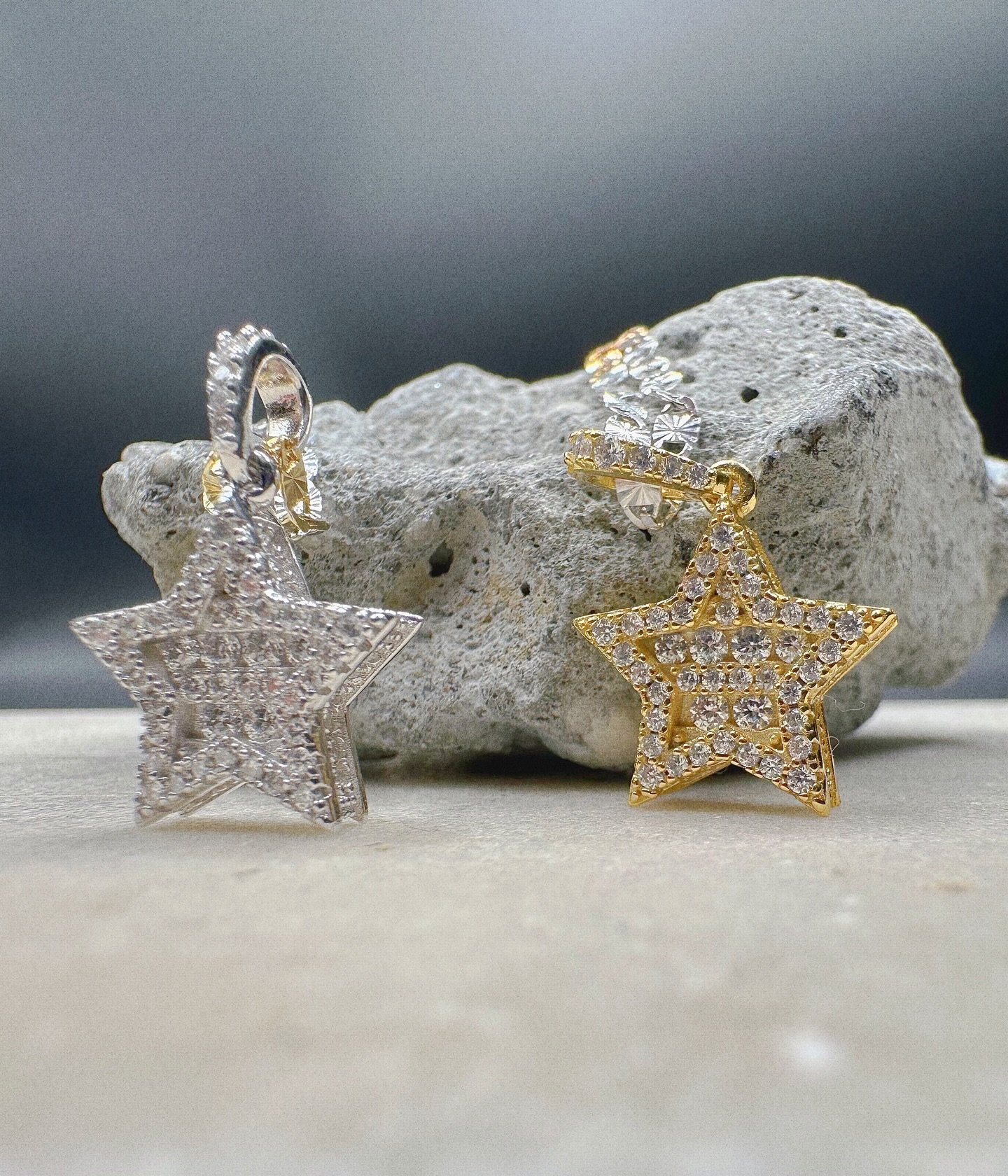 BKB ALL STAR NECKLACE 

- Illuminate your style with the BKB Moissanite Baguette Cut Star Charm! This exquisite mini star charm features dazzling baguette cut Moissanite stones, expertly encrusted to create a radiant centerpiece. Suspended on a vibra