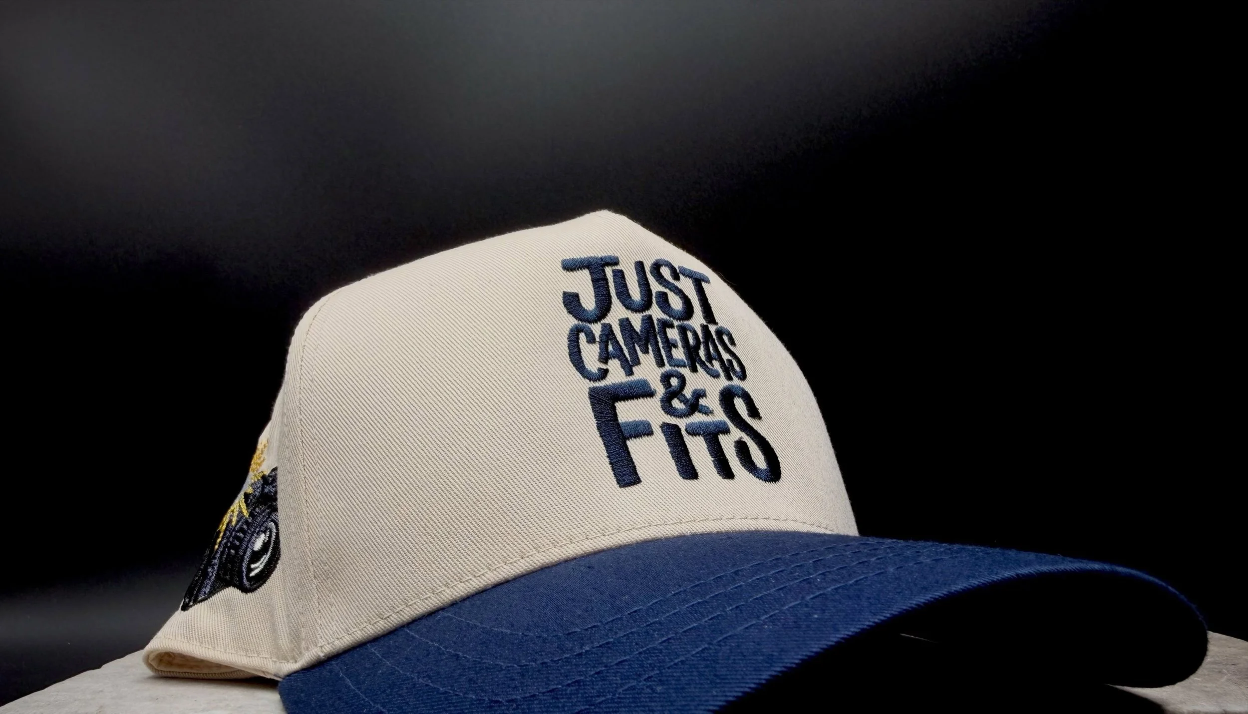 &bull;Built for photographers, creators, trendsetters, and everyday visionaries, this piece blends clean design with Brooklyn-inspired energy. Finished with bold color combinations, adjustable snapback closure, and detailed side embroidery, it delive