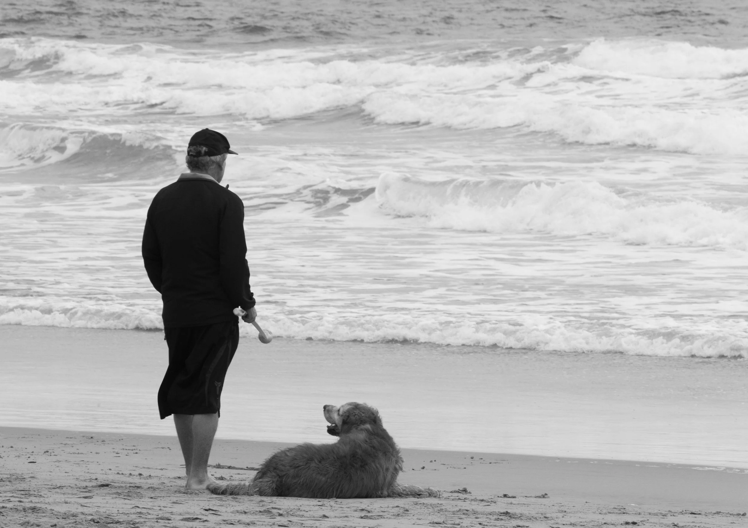  There is always something about a man and his dog. Dog Beach, Huntington Beach, Ca. 
