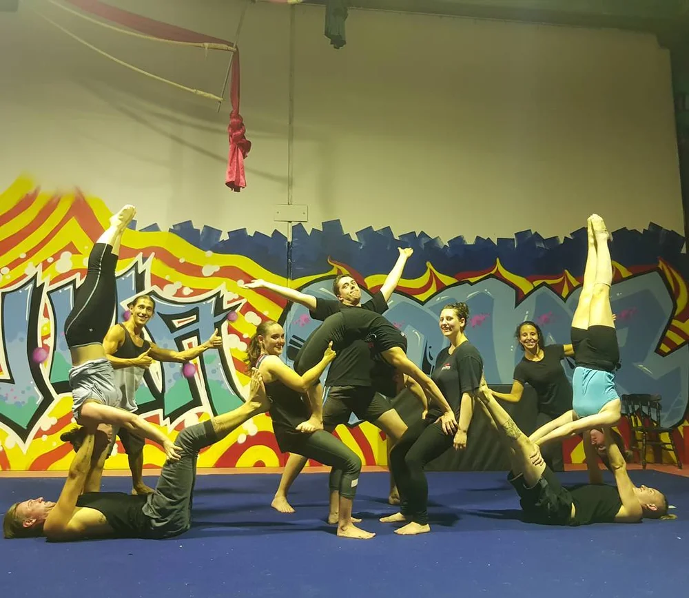 CircArts acro students building a group balance