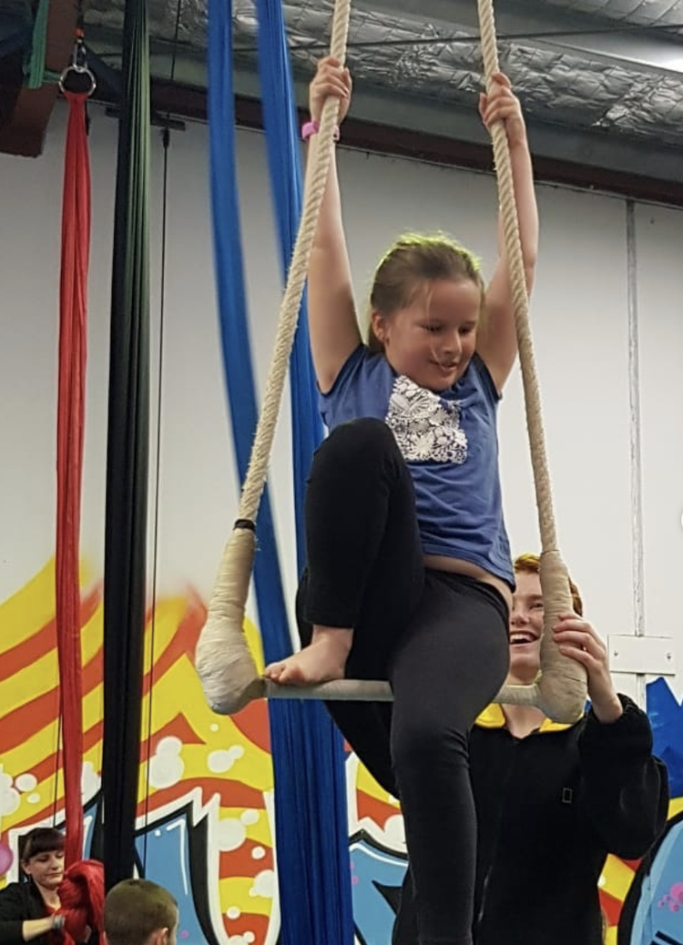 Child on the trapeze
