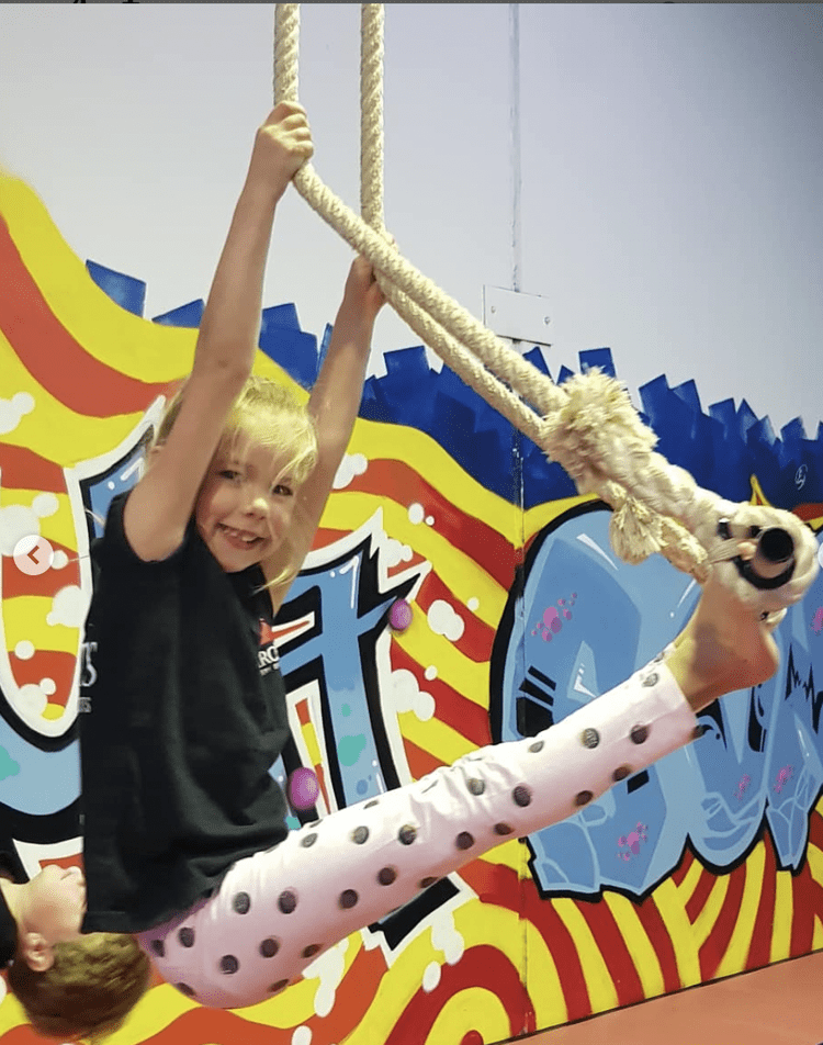 Child climbing aerial equipment