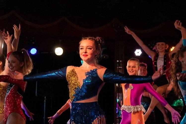 Students performing the show finale