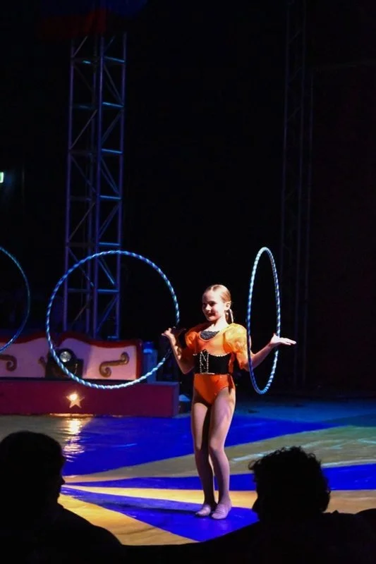 Hula hoop performer on stage