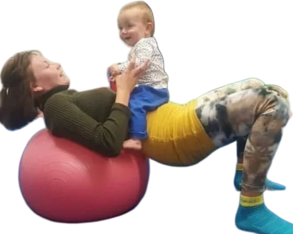 Baby exploring soft play equipment
