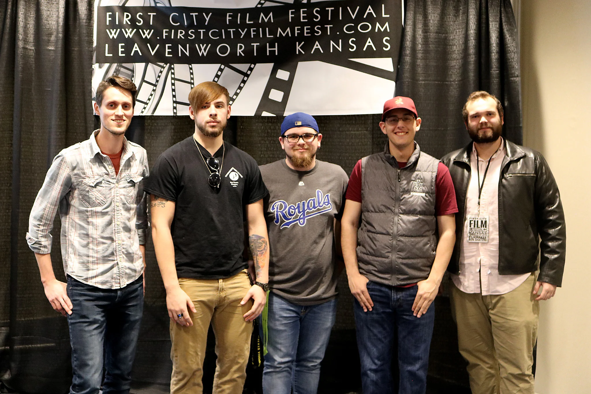 Student filmmakers pose with local filmmaker Caleb Vetter (far left) and Ben Schatzel (far right) after the First City Student Short screenings and awards March 22, 2018. Vetter also served as a judge for the student films.