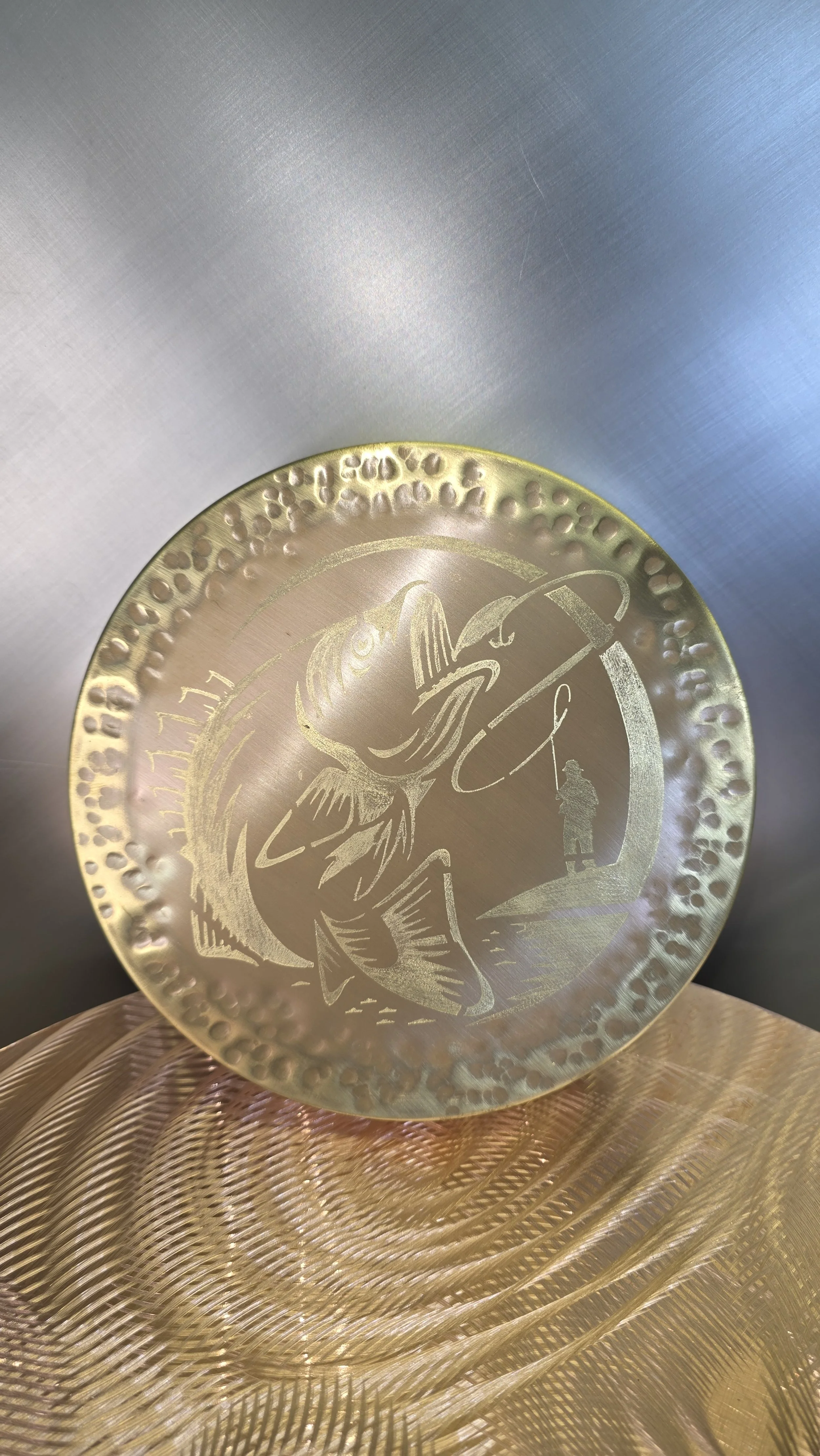 Brass cannister with fish scene etching