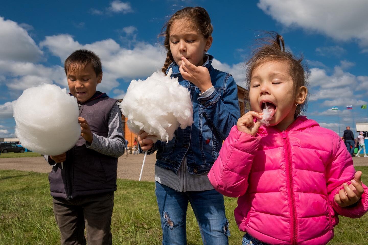 Cloud eaters!
Preparing a portfolio and found this frame of kids eating cotton candy during Sabantuy, an annual festival in Bashkortostan. 
June 2019.
What do you think?