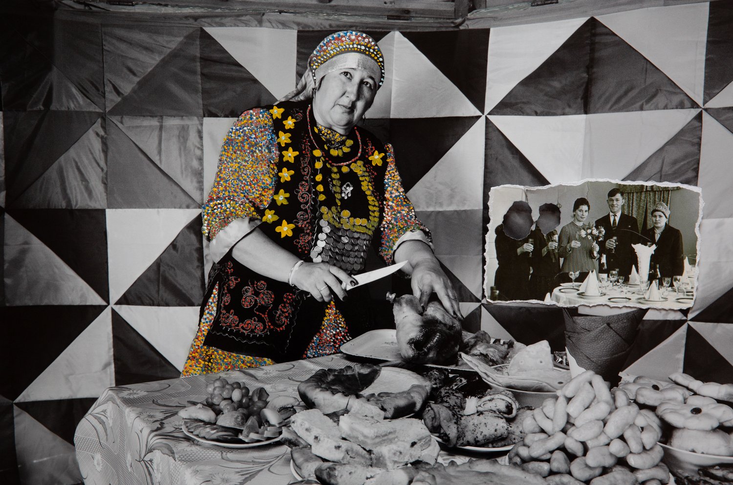  Lost Family: Exploring Soviet Identity and Post-Soviet Memory Formation. This hand painted collage features a large photo of a Bashkir woman cutting a roasted duck, with a small photo collage of my my mother's official wedding picture added to the c
