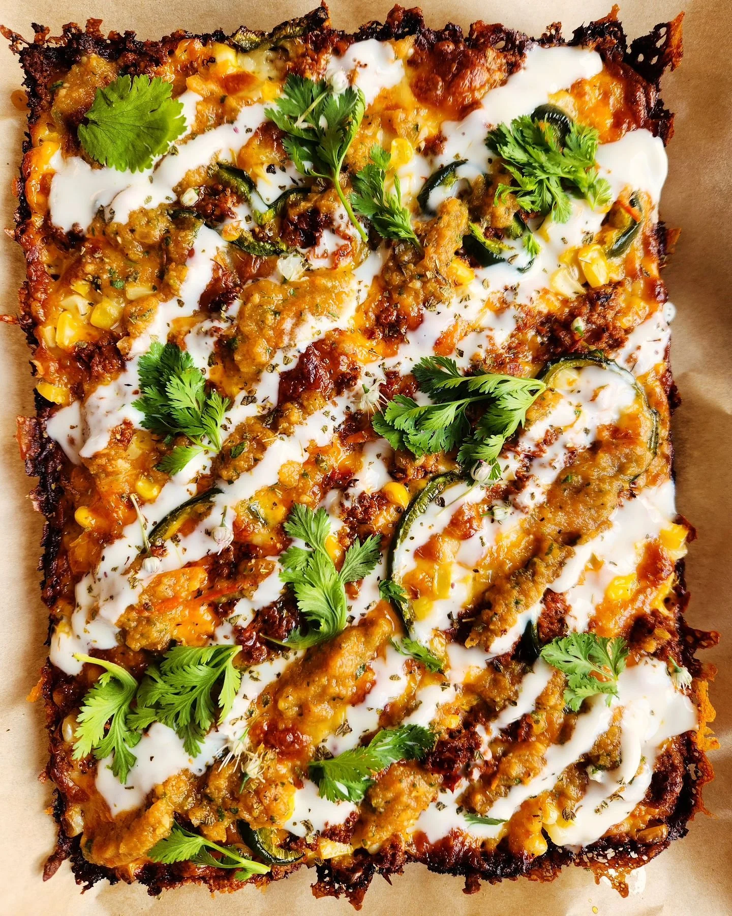 This week's feature has chicken chorizo, corn, poblano peppers, sharp cheddar, salsa, creme fraiche and cilantro. 

Tomatoes and cilantro from @ghosthouse.farm