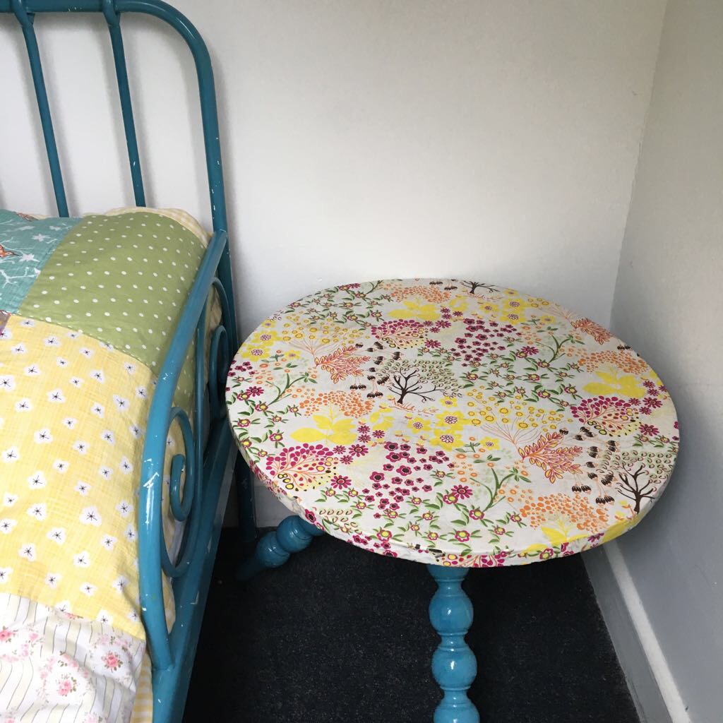 You probably get the gist now but papered side table...
