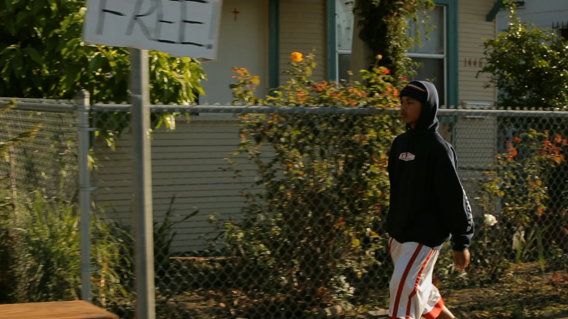 Jamany walking by FREE sign.jpg