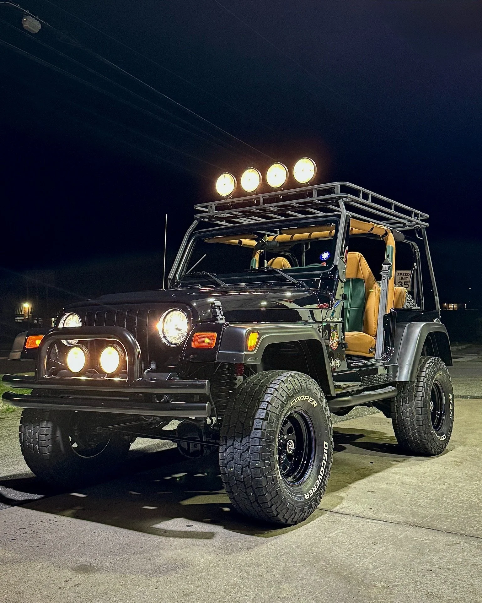 2001 Jeep Wrangler Sahara | Project Fayed

Open-air freedom, redefined.

Project Fayed transforms a classic Jeep Wrangler Sahara into a refined adventure machine, finished in deep Black Crystal with a handcrafted Cognac and British Racing Green inter