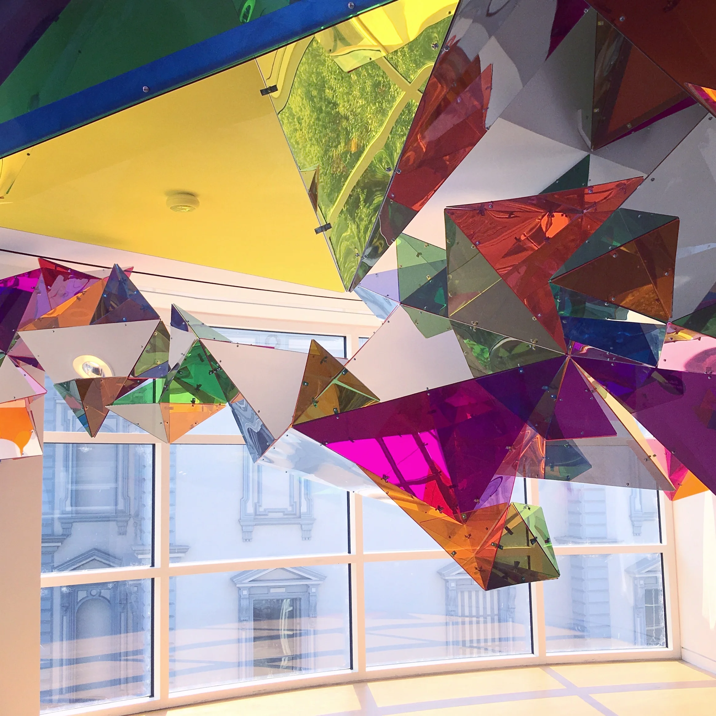 PL!NK's bold colors make for a beautiful contrast against views of the historic Crocker building.